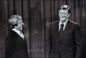 Many of Merv Griffin s interviews were filmed in black and white. Above, Griffin, left, chats with John Wayne.