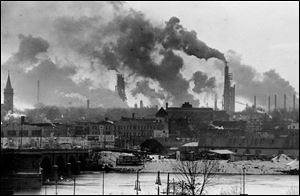 Toledo and the rest of the Great Lakes region is less polluted than in 1970, above, but still facing environmental challenges.