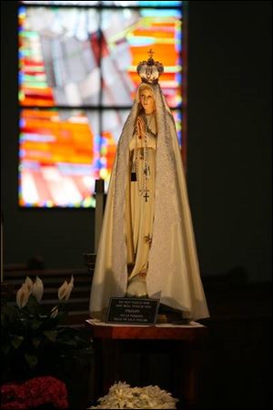 The International Pilgrim Virgin Statue is a four-foot-tall image of the Virgin Mary. Created in 1947, it is hand-carved from mahogany.
