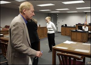 David O'Neill, entering the courtroom, faces up to 18 years in prison when he is sentenced July 14. He is free on bond.