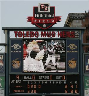 The scoreboard at Toledo s Fifth Third Field captures both the action on the field and the antics of the Mud Hens  mascots.
