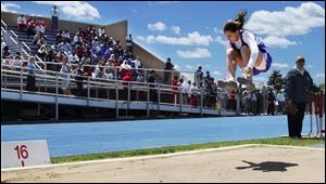 Anthony Wayne freshman Ashley Zaper leaps to a second-place finish in the long jump at 16 feet, 10 inches.