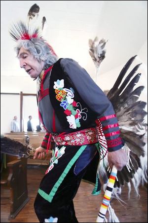 LeRoy Malaterre of the Chippewa tribe performs a dance in ceremonial clothing. Mr. Malaterre grew up on an Indian reservation in North Dakota. 