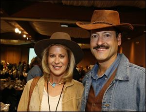 WAY OUT WEST: Donna and Sam Pesin are dressed in cowboy duds at the Western Roundup.