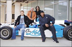From left, driver P.J. Chesson, owner Ron Hemelgarn, KISS member Gene Simmons and driver - of the lane - Carmelo Anthony are looking for a victory in the Indy 500.