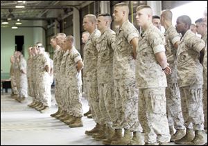 Members of the Marine Corps Reserves based in Perrysburg Township will serve about seven months in Iraq.