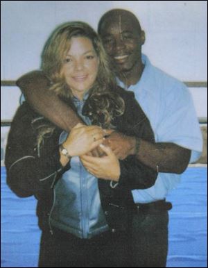 Johnnie Jordan embraces Pamela Smith, 46, in the Toledo Correctional Institution. They began corresponding in 2004. She calls him the love of her life and advocates his early release.