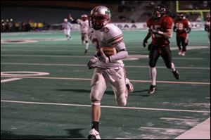 Central's Dane Sanzenbacher turned a trick play into a touchdown against Canfield last December in the Division II state finals. The 5-11, 180-pounder is only a junior.