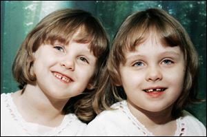 Amber and Ashley Ameling would have turned 5 in August and were to start preschool in the fall. Both died at the scene.