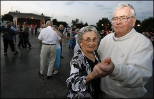 IN STEP: Irma Zingg and Dave Pelton keep in step with the tunes of Johnny Knorr Orchestra at Centennial Terrace in Sylvania.