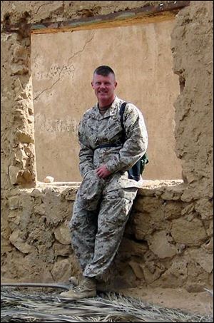 Whitmer grad Ray Post serves as a nuclear, biological, and chemical defense specialist in Iraq.