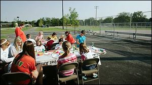 A sponge-painting camp brings out some local youths to Perrysburg Municipal Park, which has a new recreation building and reconfigured ball fields.