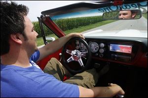 Eric Rychener of Pettisville cruises the Fulton County countryside behind the wheel of his car.