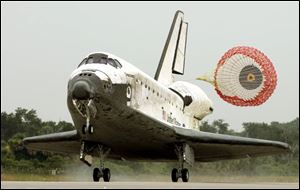 Discovery touches down this morning at Kennedy Space Center in Florida.