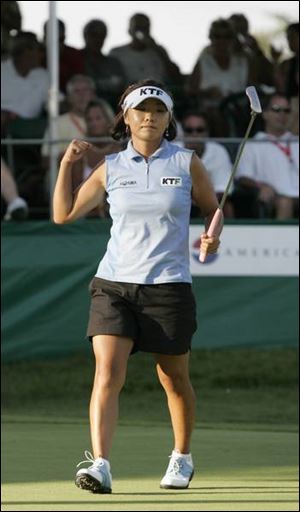 Farr Classic fans and ESPN2 might have been rooting for Natalie Gulbis to win her first LPGA tournament title, but that didn't stop Mi Hyun Kim from persevering. Kim and 
fellow Korean Se Ri Pak have combined for 30 tour wins and $15 million since '98.  
