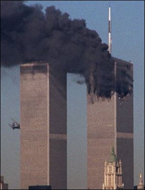 An actual photo of the event, shows a jet crashing into the second tower.