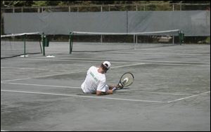 Defending champion Todd Dominiak bested James O'Connell to win his ninth City of Toledo Singles Championship, despite having to overcome a fall, cuts, leg cramps and heat. 