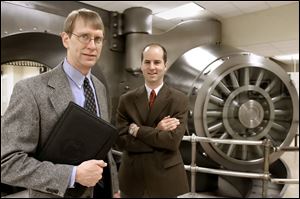 A study by Paul Bauer, left, and Mark Schweitzer of the Cleveland Federal Reserve Bank concluded that patents per-capita were the source of Ohio's wealth. They cited a decrease in patents as the cause of the state's economic slump.