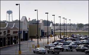 A Wal-Mart Supercenter stands next to the former Huffy Corp. factory into Celina. Some observers blamed Huffy's departure on its quest for cheap foreign labor to satisfy discount retailers.