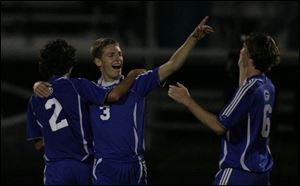 From left, Anthony Wayne's Nick Smith, Tim Green and Logan Ferguson celebrate the fifth-ranked Generals' win over sixth-ranked Northview in a battle for NLL supremacy.