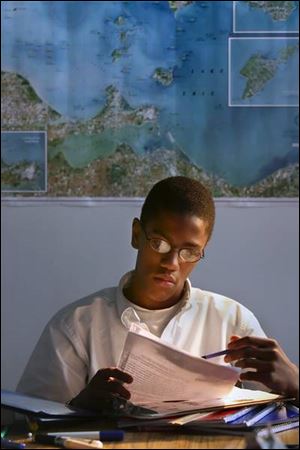 Kameron Tatum, 14, studies at the briefly opened Maritime Academy of Toledo on South St. Clair Street.
