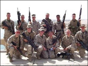 All but one of the members of the 1st squad, 3rd platoon, Lima Company pictured here
were killed Aug. 3, 2005, when their armored vehicle struck an explosive device. Combat
Diary: Marines of the Lima Company is one of the best Iraq war documentaries.
