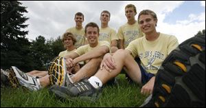 The Titans are aiming for a state cross country championship this season and are ranked second in the state in Division I. The top runners include (front, from left) Matt Lemon, Joe Miller and Chris Lemon and (back, from left) Chris Madaras, Ben Schoonmaker and Brett Wagner. 