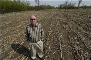 John Rapanos of Midland, Mich., who had filled in 54 acres of wetlands, was at the center of the case on constitutional private property rights. The Supreme Court ruled in his favor in June.