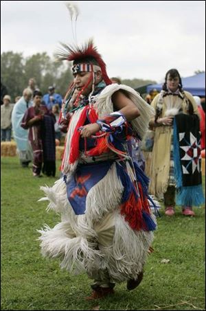 Detroit resident Peter Chiquito, of Navajo and Apache descent, dances during the American Indian gathering.
