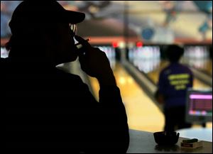 Bowling alleys would be exempt from smoking restrictions if Issue 4 is approved by voters.