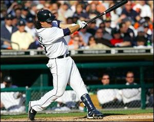 Magglio Ordonez slugs a solo home run in a three-run Tigers' second inning. He finished with two RBIs and three runs.