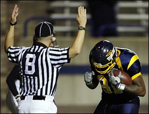 Toledo's Chris Hopkins celebrates an early touchdown against Central Michigan. 