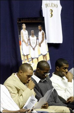 Rocket basketball players, from left, Florentino Valencia, Anthony Byrd, and Jerrah Young reflect on the life of teammate Haris Charalambous, who died Monday of a heart condition at age 21.
