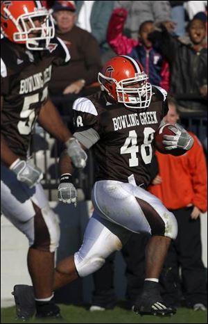 Terrel White runs back an interception Saturday against
Eastern Michigan. He says he and
his teammates are going to have
to prepare mentally more for
tonight s game than any other
week because of the short week of
practice and limited time to watch film on the Falcons  opponent,
Central Michigan.
