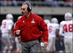 Ohio State coach Jim Tressel was pumped in the first half when his team scored all 17 of its points against Illinois.