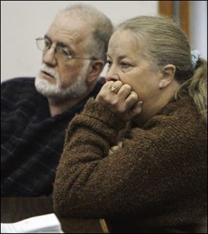 Michael, left, and Sharen Gravelle listen to the judge before jury selection starts in their trial on child endangering charges.