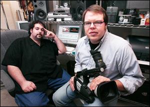 Filmmakers Jacob David, left, and Joel Washing in their office
in downtown Toledo, Ohio.