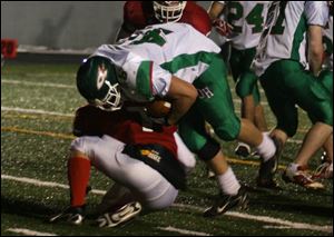 Jake Lipstraw led the Rockets with 86 yards on 18 carries as Oak Harbor ran for 151 yards but scored three TDs passing.