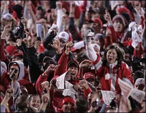 Ohio State fan celebrate at Ohio Stadium after Saturday's OSU victory over Michigan 