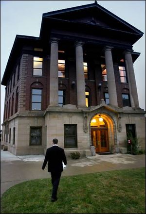 The Hillsdale College student and mayor heads toward a night meeting of City Council.