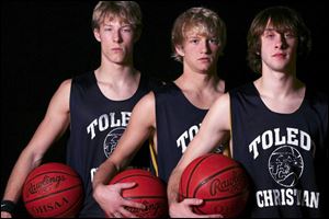 Jacob Weemes, left, Blake Powell, and Tyler Boris will anchor Toledo Christian, which finished 20-4 last season.