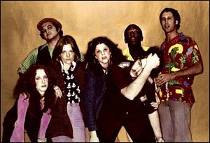 Original Saturday Night Live cast members in 1975 are, from left, Larraine Newman, John
Belushi, Jane Curtin, Gilda Radner, Garrett Morris (back), Dan Aykroyd, and Chevy Chase.
