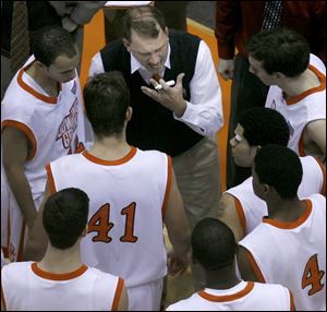 Bowling Green State University coach Dan Dakich tries to fire up the troops yesterday in Anderson Arena, but his Falcons hit just 32 percent from the field and lost to Central Arkansas. BGSU's record is now 4-3.