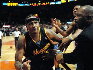 Nuggets' Carmelo Anthony prepares to do battle with Knicks.