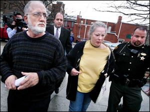 Michael and Sharen Gravelle leave the Huron County Courthouse after the verdict. 