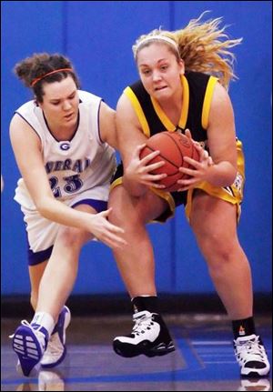 Anthony Wayne s Jordyn Sadowski, left, battles for a loose ball with Northview s Nicole Munch during Northern Lakes League action last night. The Generals are 5-1 and 4-0 in the NLL.
