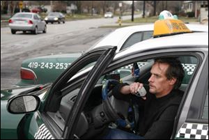 Matt Ward, of Checker Cab, expects to make at least $400 in fares and tips from New Year's celebrators.