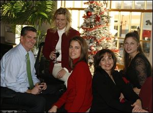 Among the guests at the Hardy Communications party were, from left, Larry Dillin, Cheryl Hardy, Meredith Griffin, Cheryl Nicolaidis, and Terri McCullough.
