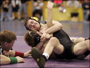 Waite s Scott Fuller pins Robbie Nein of Reynoldsburg to win the 119-pound title in the Mary Kerr Memorial Tournament.