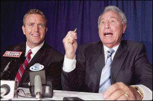 Kirk Herbstreit, left, and ESPN sidekick Lee Corso answer
questions prior to the Italian American Sports Club banquet.
